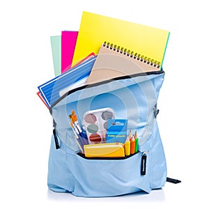 Blue backpack with school supplies