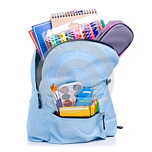 Blue backpack with school supplies