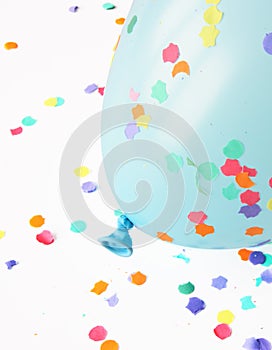 Blue balloon with confetti