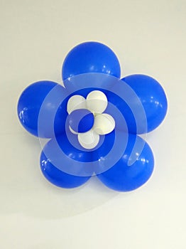 Blue balloons decoration in a office.