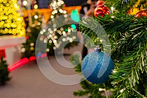 Blue balls decorated with Christmas tree decorations. New year and Christmas festivals. Copy space background