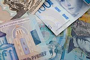 Blue banknotes of different world currencies