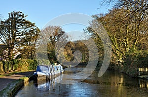 Blue barge moored on the Lancaster Canal