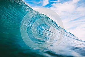 Blue barrel wave in ocean. Big wave for surfing