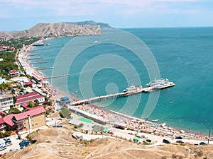 The blue bay with a berth for yachts and boats.