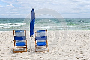 Blue Beach Chairs with Umbrella on Gulf Shores Beach