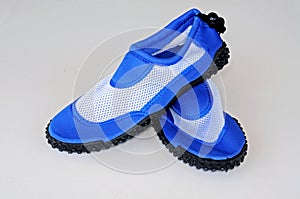 Blue beach shoes.