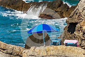 Blue Beach Umbrella and Two Deck Chairs - Rocky Beach Liguria Italy