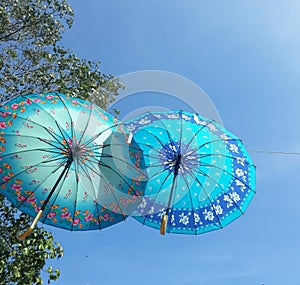 blue beach umrella and blue sky