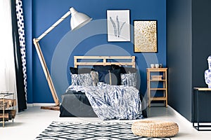 Blue bedroom with gold accents photo