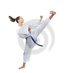 With a blue belt, an adult girl beats a kick