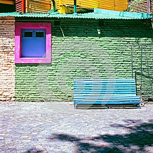 Blue bench against green wall, La Boca, Caminito, Buenos Aires