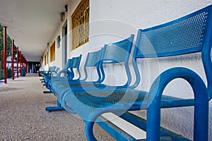 Blue bench in school yard