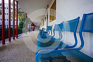 Blue bench in school yard