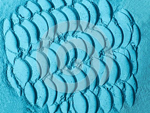 Blue bentonite facial clay powder alginate mask, face cream, body wrap texture close up, selective focus. Abstract background