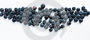 Blue berries on a white background. Fresh delicacy, top view.