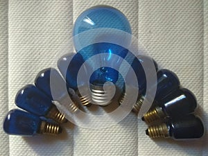 Blue big and small light bulbs