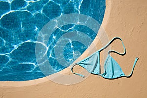 Blue bikini top at the poolside