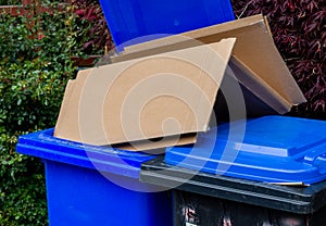 Blue bin with waste paper