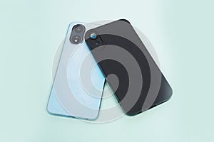 Blue and black case for iPhone, isolated on blue background.