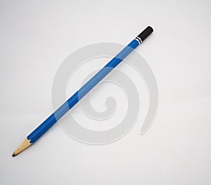 Blue and black pencil on white background.