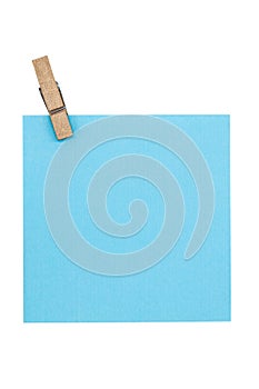 blue blank note with a wooden clothespin