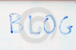 Blue blog on whiteboard