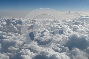 Blue-blue sky from an airplane window.