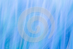 Blue blurred abstract background with a predominance of lines