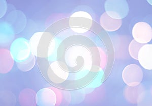 Blue blurred bokeh background,white and pink circles, abstract