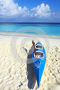 Blue boat is on a beach 2