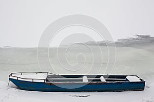 Blue Boat in Frozen River