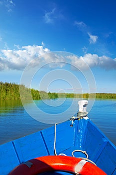 Blue boat sailing in Albufera lake of Valencia