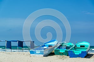 Blue Boats on Canoa Beach photo