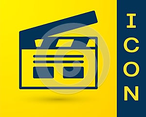 Blue Bollywood indian cinema icon isolated on yellow background. Movie clapper. Film clapper board. Cinema production or