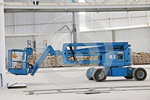 Blue boom lift indoor