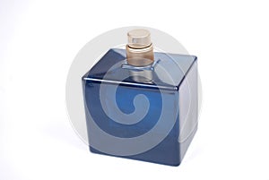 Blue bottle of perfume without cover on a white background.