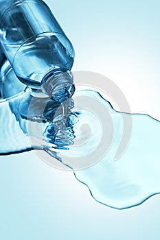 Blue bottle of water leaking