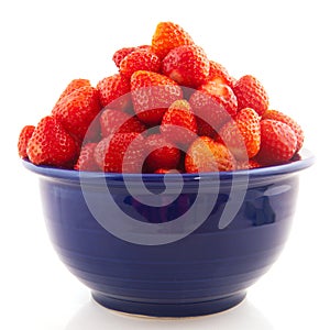 Blue bowl with strawberries