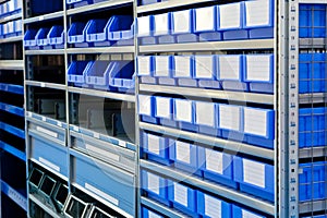 Blue boxes on a stock bin in warehouse