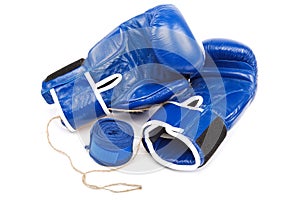 Blue boxing gloves and bandages on a white background.