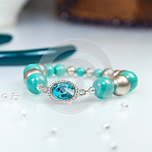 Blue bracelet with blue crystal stone photo