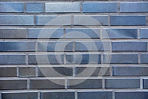 Blue brick stone wall texture grunge background;