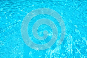 Blue and bright ripple water and surface in swimming pool