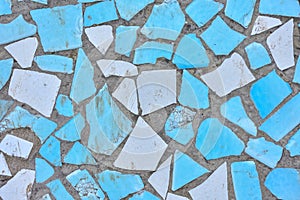 Blue broken ceramic tile mosaic background. Broken tiles mosaic seamless pattern. Blue the tile wall high resolution real photo or