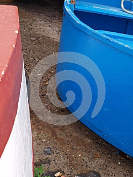 Blue and brown fishing boats in Madeira