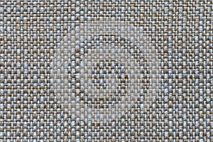 Blue and brown textile background with checkered pattern, closeup. Structure of the fabric macro.