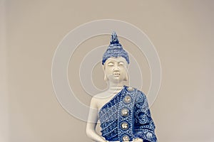 Blue buddha image on white background