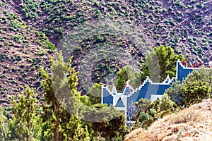 Blue building in the Atlas mountains, Morocco. With selective focus