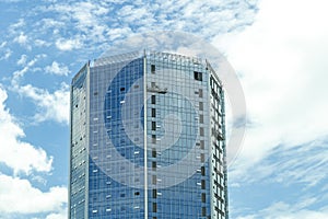 Blue building construction and elevator of worker blue sky and clouds background